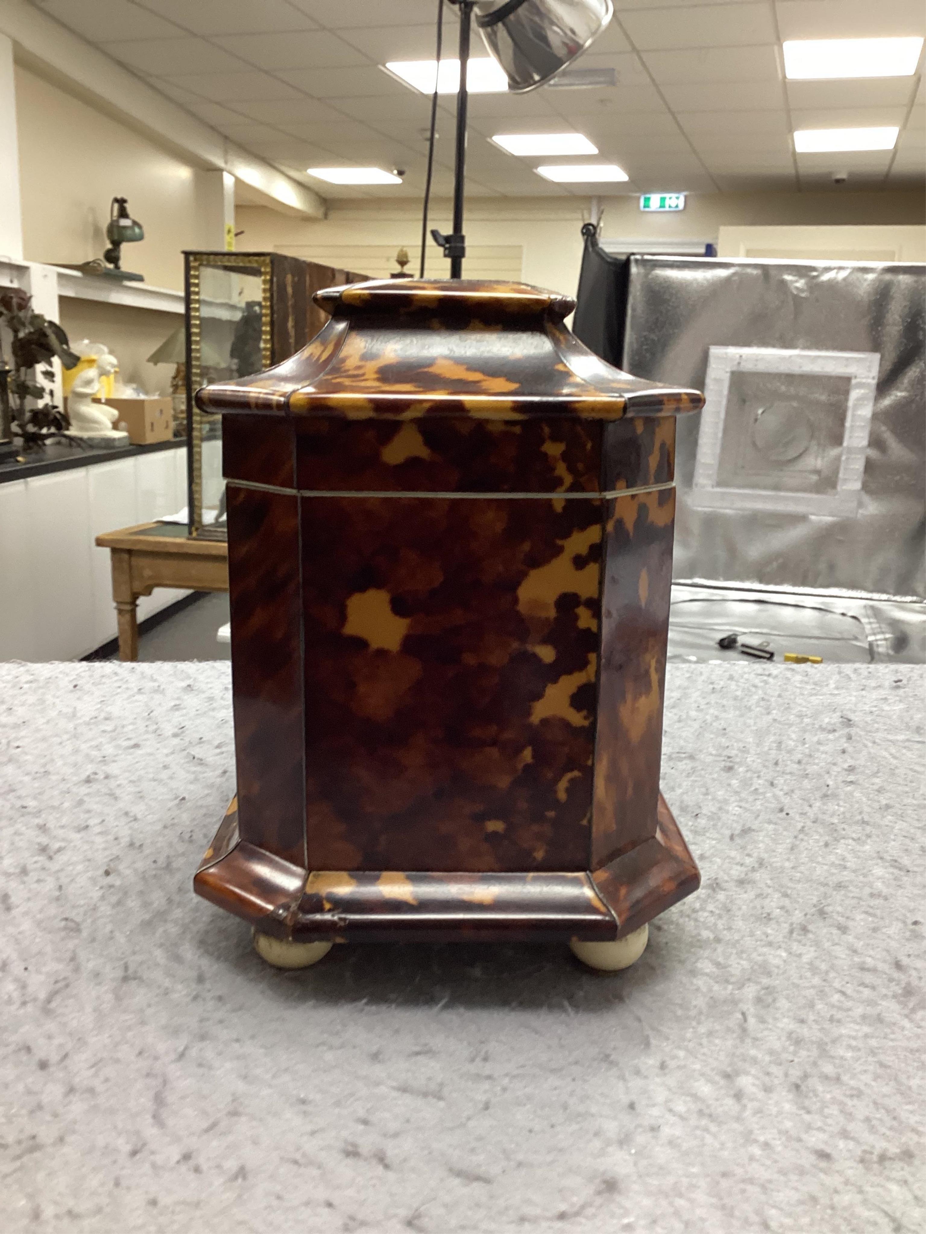 A Regency blond tortoiseshell and mother of pearl tea caddy